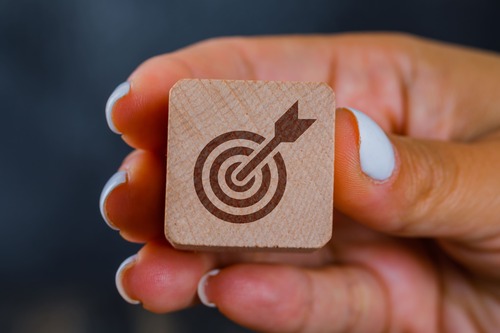 hand-holding-wooden-cube-with-ta